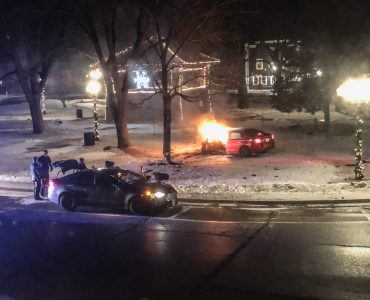 Car crash/fire on East Troy Square